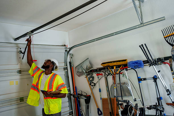 Professional Garage Door Installation technician working in Evergreen, MT